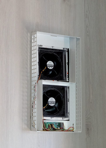 AIRUNIT GEMINI twin fan ventilation system installed within an interior wall